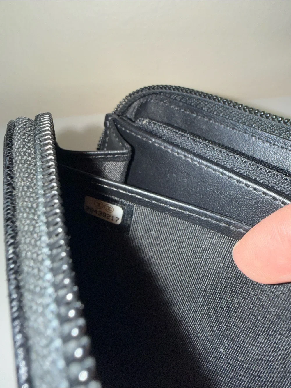 CHANEL Black Quilted Zip-Around Wallet with Gold CC Lock